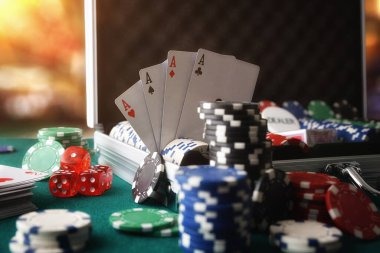 Multi-camera live dealer studio showing blackjack table with professional dealer and card deck
